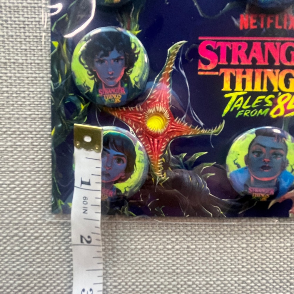 Netflix Stranger Things Tales From 85 Button Pin Set 8 Piece Collectible Badges - Picture 3 of 3